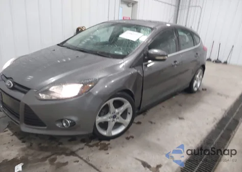 2014 Ford Focus Titanium z USA, uszkodzony, nr VIN 1FADP3N24EL436502